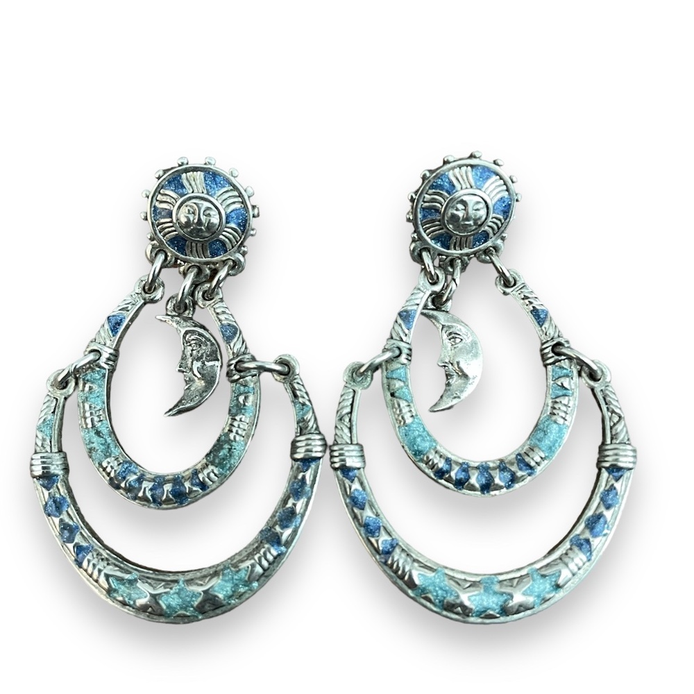 Silver and Blue Dangling Earrings with Sun and Moon Motif.